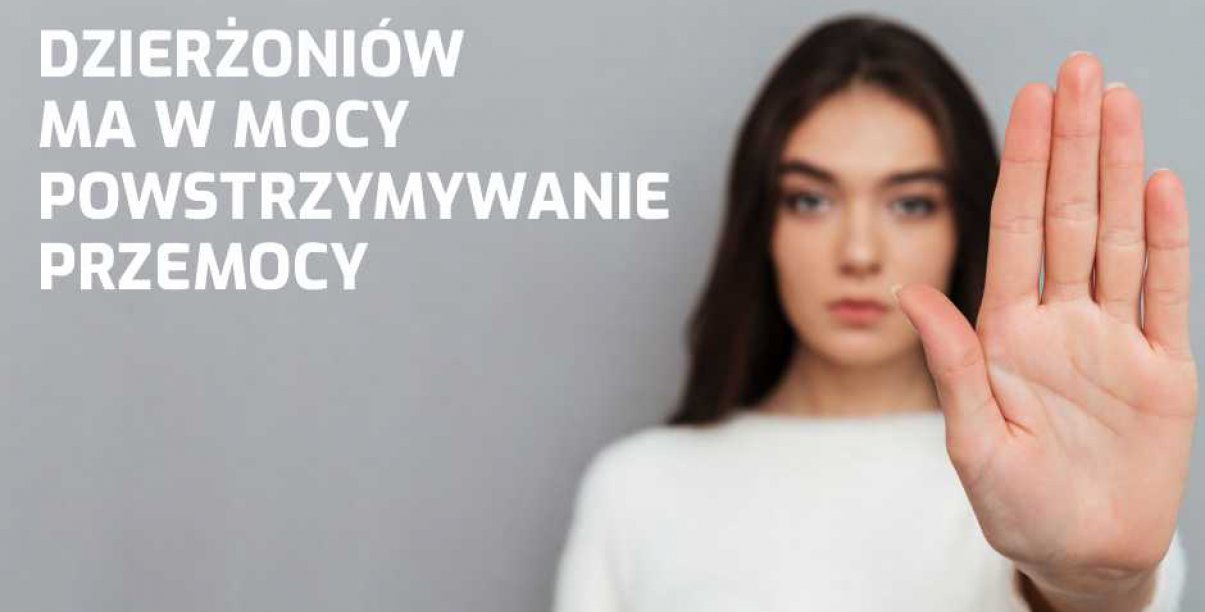 Na zdjęciu kobieta z wyciągniętą dłonią i napis „Dzierżoniów ma w mocy powstrzymanie przemocy”