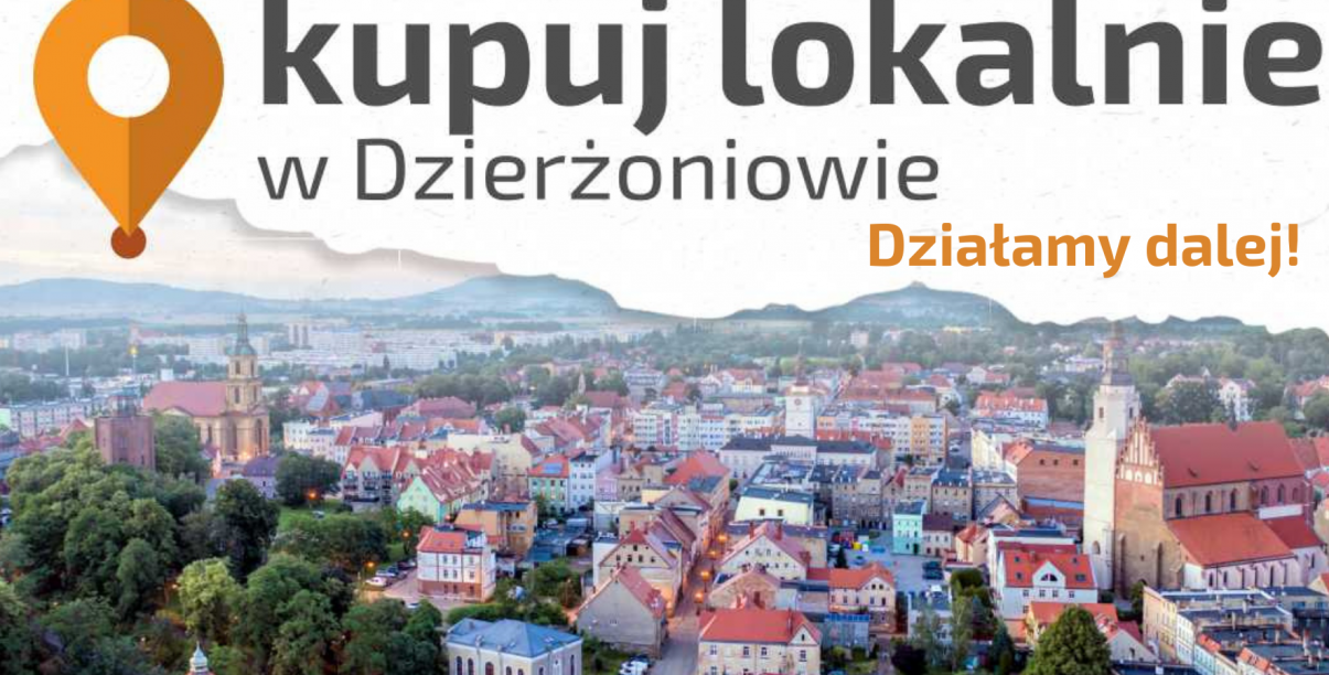 Zdjęcie miasta z lotu ptaka i napis Kupuj Lokalnie - dziłamy dalej