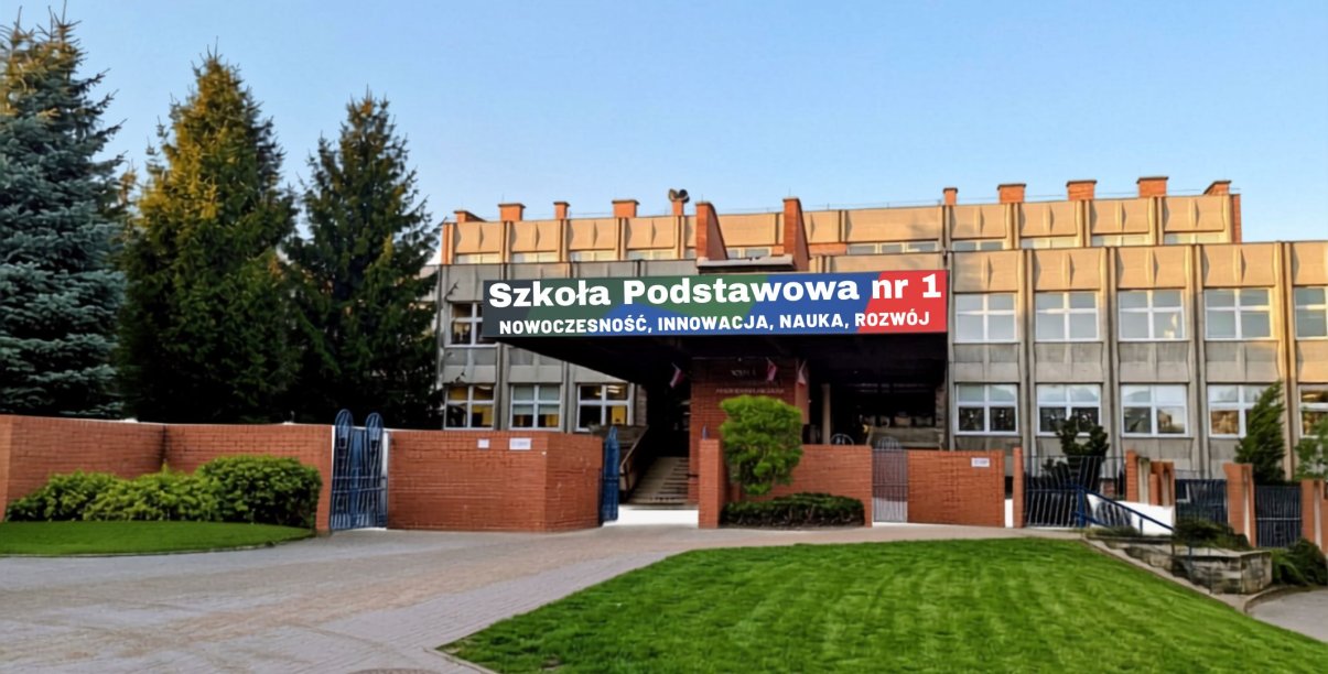 Szkoła od strony wejścia, nad wejściem duża nazwa szkoły
