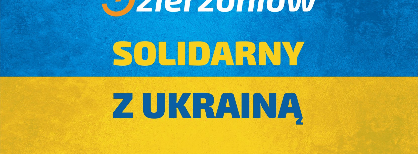 Napis Solidarni z Ukrainą na niebieskim i żółtym tle