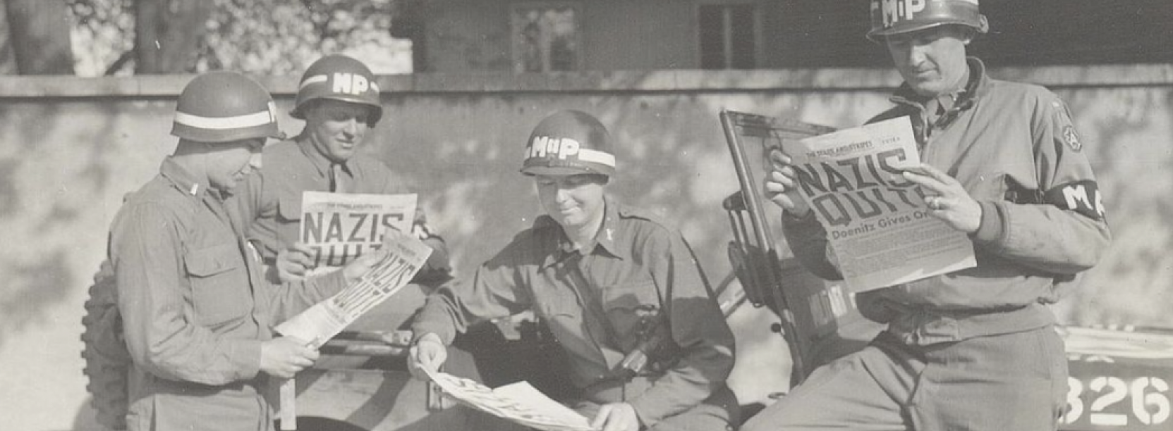 Czarno-biała fotografia sześciu żołnierzy 