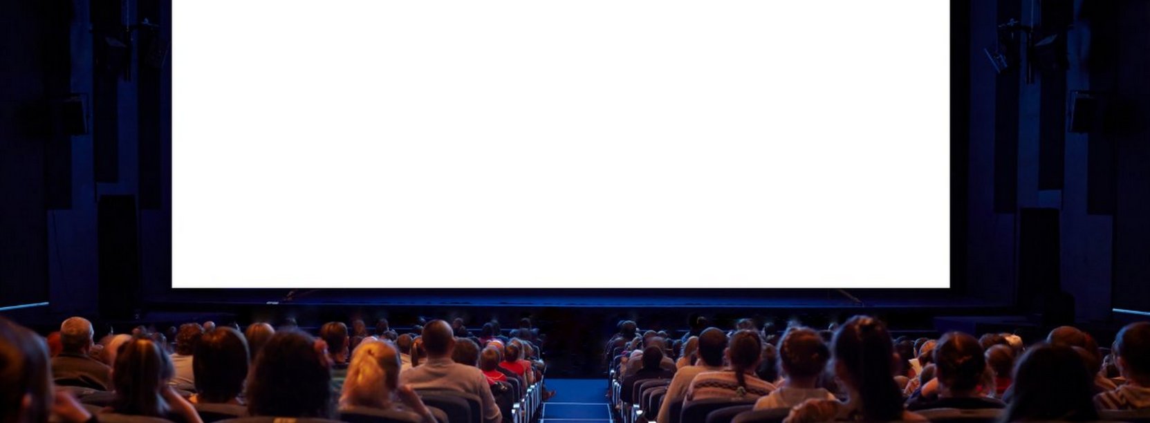 Sala kinowa, ludzie siedzący w fotelach przed pustym ekranem