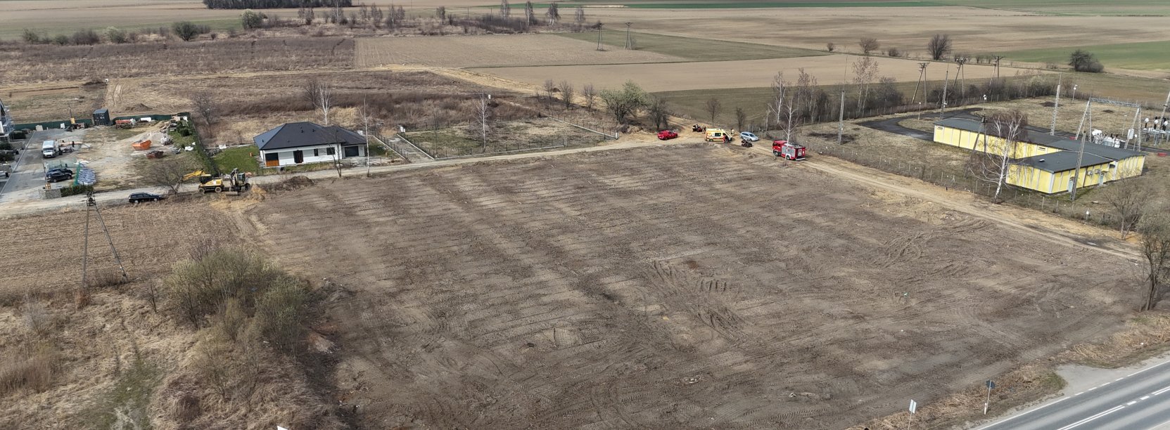 Teren z lotu ptaka z wyznaczonymi działkami pod zabudowę
