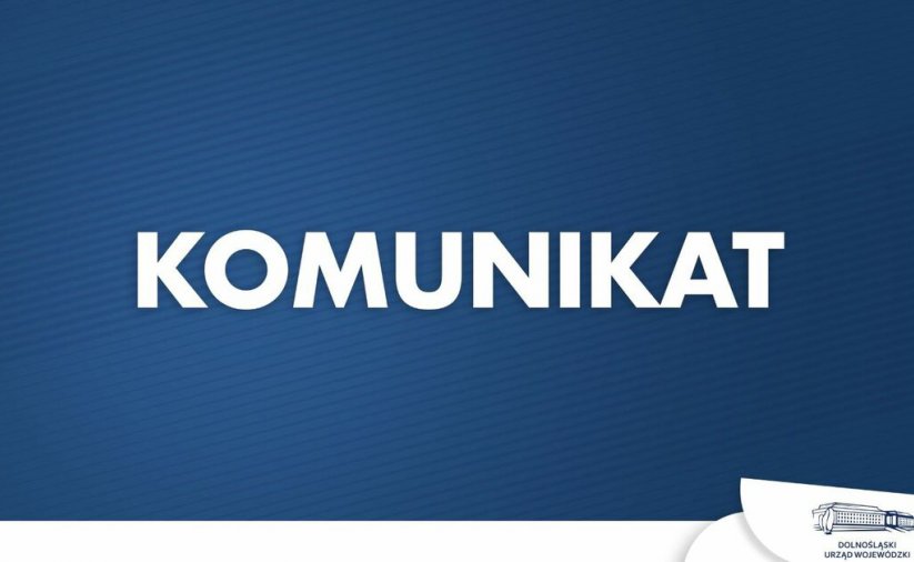 Biały napis "Komunikat" na granatowym tle